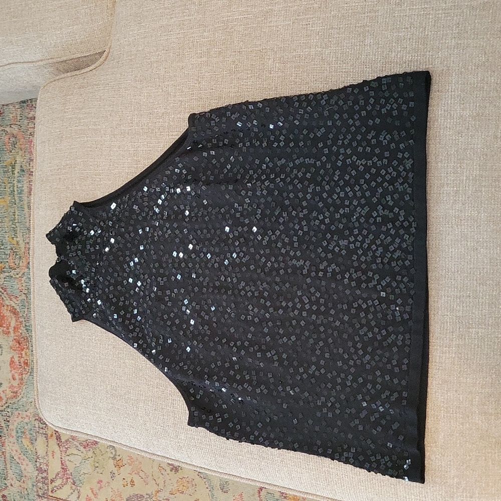 Sleeveless sequin front mock turtleneck